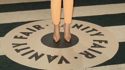 No gallery would be complete without the weirdest look of the evening. Singer Sia, who stayed true to her policy of never showing her face, teamed a two-tone wig with a tangerine suit. Danny Moloshok / Reuters