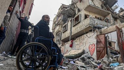 Palestinians look at the rubble of a home destroyed in an overnight Israeli air strike in the Rafah refugee camp in southern Gaza. AFP