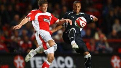 Martin Cranie of Charlton battles with Nicky Maynard of Bristol City during the Coca Cola Championship match between Charlton Athletic and Bristol City at The Valley.