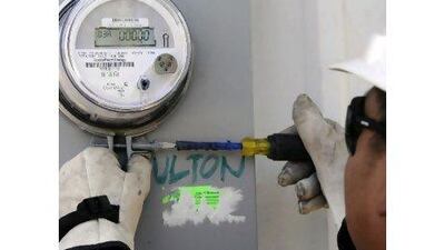 Health concerns in the US are creating a backlash against smart meters, which measure electrical usage in homes. Pat Sullivan / AP Photo
