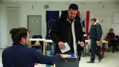 A man casts his vote in local elections at a polling station on February 12 in Berlin. Getty