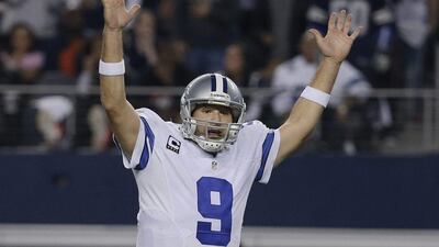 Dallas Cowboys quarterback Tony Romo reacts after a touchdown during his team's NFL play-off win over the Detroit Lions on Sunday. Tony Gutierrez / AP / January 4, 2015