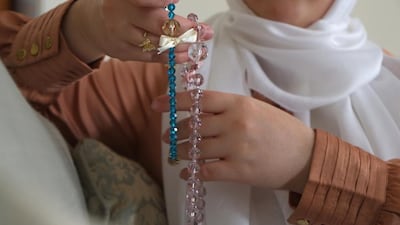 Prayer beads suitable for Ramadan are being made by Somaiya Nabil after she was inspired by a visit to Dragon Mart in Dubai. Delores Johnson / The National