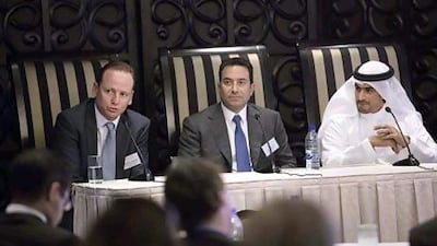 Chief operating officers all, from left to right: Jonathan Swann of JP Morgan Dubai; Joe Barchini of Deutsche Bank; and Abdulla al Gurg of the Easa Saleh Al Gurg Group. Jaime Puebla / The National
