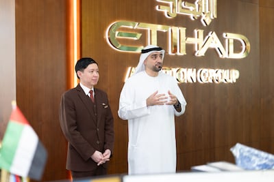 Allan Espiritu with captain Majed Al Marzouqi, the airline's chief operations and guest officer. Photo: Etihad