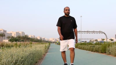 Abdalla Al Baloushi had a car accident three years ago, which left both of his legs paralyzed. Today, he is among the active runners at the newest recreational track in Salam Street. Fatima Al Marzooqi / The National.