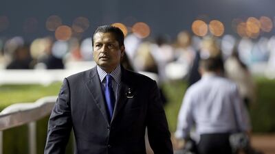 Trainer Satish Seemar once again sends Reynaldothewizard out to contest for wins at Meydan Racecourse. Satish Kumar / The National