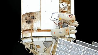 In this photo taken from video footage released by Roscosmos Space Agency, Roscosmos' cosmonauts Oleg Artemyev and Denis Matveev are seen during their spacewalk on the International Space Station (ISS), Wednesday, Aug. 17, 2022. Roscosmos' cosmonauts Oleg Artemyev and Denis Matveev make a spacewalk at the space station to continue installation work of the European Space Agency's robot arm on the new Russian lab. (Roscosmos Space Agency via AP)