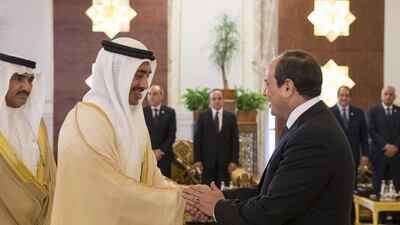 Sheikh Abdullah bin Zayed, Minister of Foreign Affairs and International Cooperation, greets Abdel Fattah El Sisi, President of Egypt, during a reception at the Presidential Airport. Seen with HE Ahmed Juma Al Zaabi, UAE Deputy Minister of Presidential Affairs. Ryan Carter / Crown Prince Court - Abu Dhabi