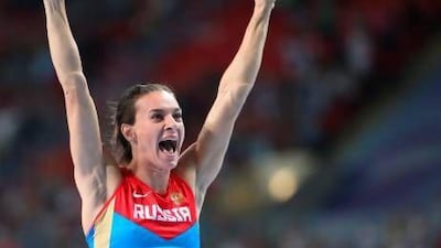 Russia's Yelena Isinbayeva clears the bar at 4.89m during the women's pole vault final. Sergei Ilnitsky / EPA