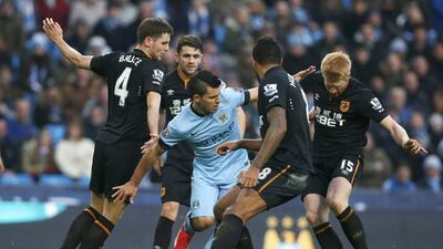 Sergio Aguero and Manchester City were smothered by Hull City defenders in a 1-1 draw at Etihad Stadium yesterday. Andrew Yates / Reuters