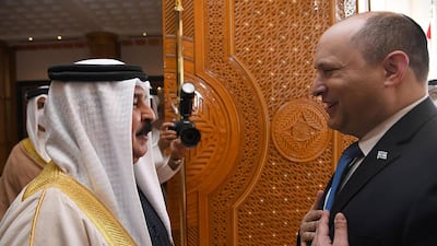 Bahrain's King Hamad, left, meets Israeli Prime Minister Naftali Bennett in Manama. Israel OUT / AFP