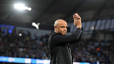 Burnley manager Vincent Kompany applauds supporters at the Etihad Stadium. AFP