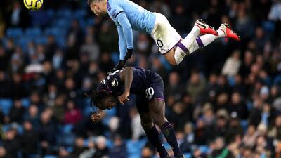 City's Nicolas Otamendi in action with West Ham's Michail Antonio. Reuters