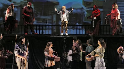 Fadi, a Syrian child plays Oliver among amateur cast of Jordanian and Syrian refugee children. Salah Malkawi for The National