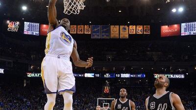 Golden State Warriors forward Andre Iguodala dunks the ball against the San Antonio Spurs on Monday night in the NBA. John G Mabanglo / EPA