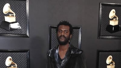 Gary Clark Jr. chooses a velvet tailored suit for the 62nd Annual Grammy Awards. EPA