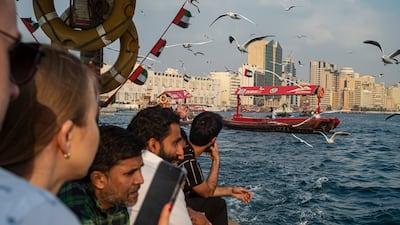 Tourists and residents using the abra water taxis to cross the Creek waterway that divides Deira and Bur Dubai. Respect, co-operation and everyday decency between strangers across 200 nationalities are a must. Antonie Robertson / The National