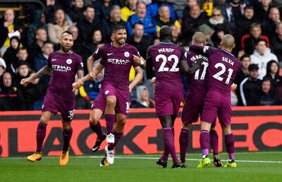 epa06208698 Manchester City's Sergio Aguero (2-L) celebrates after scoring against Watford during their Premier League match at Vicarage Road Stadium Watford, Britain, 16 September 2017. EPA/WILL OLIVER EDITORIAL USE ONLY. No use with unauthorized audio, video, data, fixture lists, club/league logos or 'live' services. Online in-match use limited to 75 images, no video emulation. No use in betting, games or single club/league/player publications.