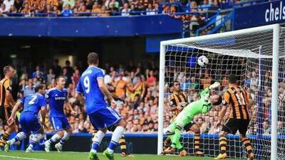 Hull goalkeeper Allan McGregor saves Branislav Ivanovic's header at the second attempt as Hawk-Eye was used for the first time in the Premier League yesterday at Stamford Bridge. The goal-line technology showed the whole of the ball did not cross the line. Richard Heathcote / Getty Images