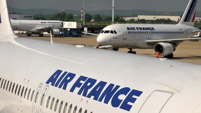 Air France cut its full-year earnings forecast in July amid overcapacity on North American and Asian routes and poor demand for freight. Antoine Antoniol / Bloomberg News