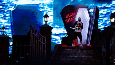 Eminem emerged from the stage wearing a coffin and gripping a chainsaw. All photos by MDL Beast