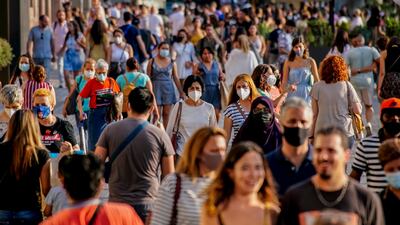 A busy street in downtown Barcelona, Spain, on Saturday, July 3. AP