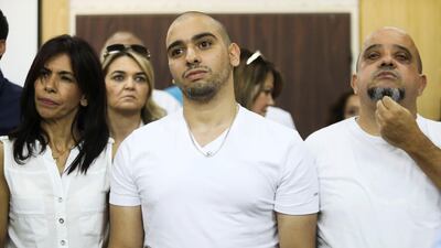 Former Israeli soldier Elor Azaria (centre) is pictured here at an Israeli military appeals court in Tel Aviv on July 30, 2017. Dan Balilty / Pool / Reuters
