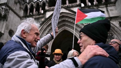 Protesters react after hearing the decision. AFP