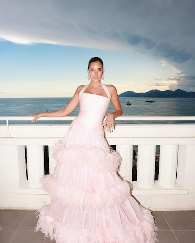 Amina Khalil on a balcony overlooking the Croisette in Rami Kadi. Photo: Amina Khalil / Instagram