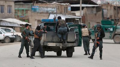 Afghan personnel arrive at the site of an attack in Kabul, Afghanistan. AP Photo