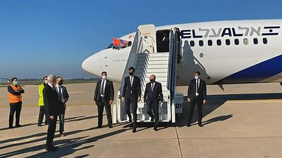 A screen grab from a handout video released by the US embassy in Morocco shows US President's advisor Jared Kushner (L) and Israeli National Security Advisor Meir Ben Shabbat leaving the plane upon landing, in Moroco's capital Rabat, on the first Israel-Morocco direct commercial flight, marking the latest US-brokered diplomatic normalisation deal between the Jewish state and an Arab country. AFP