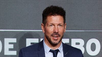 Atletico Madrid's Argentinian manager Diego Simeone poses with the Miguel Munoz Award for the best coach during the awards organised by Spanish newspaper Marca. EPA