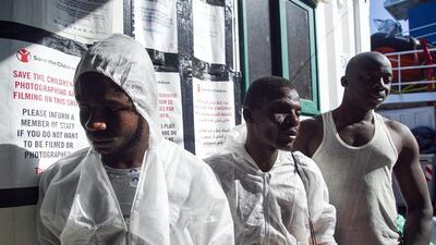 Migrants and refugees after being rescued from the Mediterranean off the coast of Libya. Mystyslav Chernov / AP