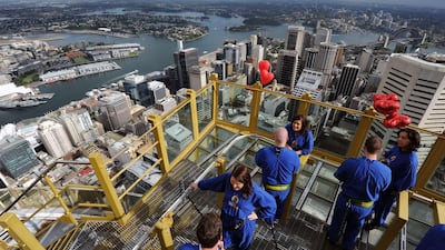 Newly introduced couples are given five minutes to talk to each potential partner at the summit of the Sydney Tower on February 14, 2012. Standing at 260 metres above street level, Sydney’s highest viewing platform, a total of 14 singles search for a lo???