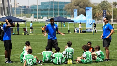 The ESG Football Academy from Oman (green) under 12 age group.