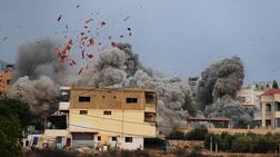 Smoke rises following an Israeli air strike in the village of Teir Debba, southern Lebanon. AP