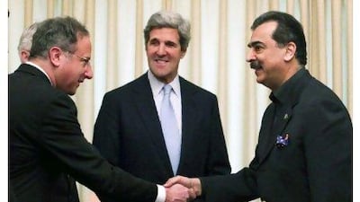 A US delegation led by Senator John Kerry, centre, met the Pakistani prime minister, Yousuf Raza Gilani, right, in Islamabad yesterday.