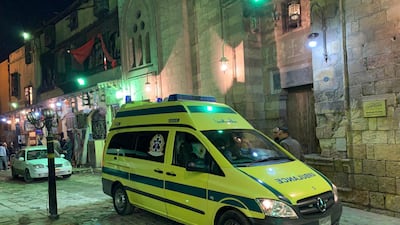 An ambulance arrives at the scene of the explosion. Three other police officers were wounded in the blast. EPA