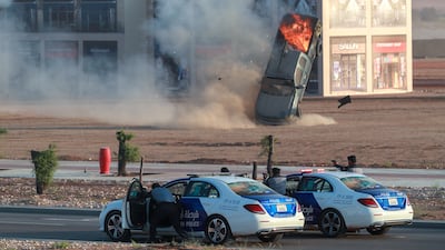 A mock field was set up with different buildings depicting houses, a clinic, a cafe, a football stadium and a university. Actors played citizens walking throughout the mock city