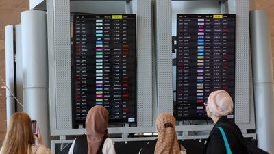 Passengers at Ben Gurion international airport in Tel Aviv check cancelled flights. Airlines' net margins will rise to 3.7 per cent in 2025, from 3.4 per cent in 2024, Iata's latest report says. AFP