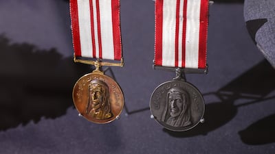 Commemorative medals presented to Abu Dhabi police during the opening of Al Maqta'a Bridge in 1968