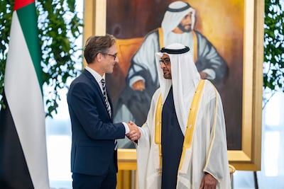 President Sheikh Mohamed receives the credentials of Mr Tunkel during a ceremony welcoming new ambassadors to the Emirates last week. Photo: UAE Presidential Court