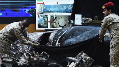 Saudi soldiers reveal the remains of missiles the Arab Coalition says are Iranian, to the media at the Armed Forces Club in Riyadh on March 26, 2018. AFP