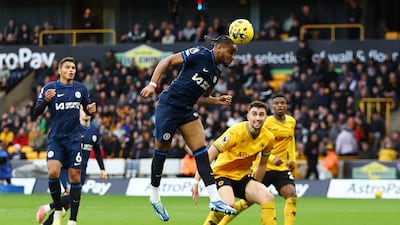 Christopher Nkunku heads home Chelsea's late consolation goal. Reuters