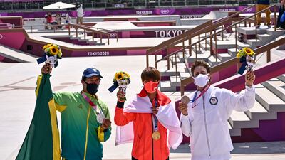 Gold medallist Japan's Yuto Horigome, silver medallist Brazil's Kelvin Hoefler and bronze medallist Jagger Eaton of the US.