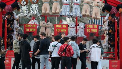 Visitors playing games at the Redfest DXB held at Dubai Media City Amphitheatre in Dubai. (Pawan Singh / The National