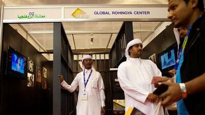 The Rohingya booth at the Dubai international aid conference, where representatives at the event hope to spread the word among international aid donors about the cause of the Rohingya. Christopher Pike / The National