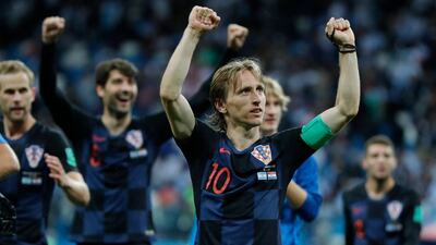 Luka Modric and Croatia celebrate their 3-0 win over Argentina on Thursday. Ricardo Mazalan / AP Photo