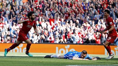 Mohamed Salah's goal against Brighton meant he became the first player to score 32 goals in a 38-game Premier League season. Phil Noble / Reuters
